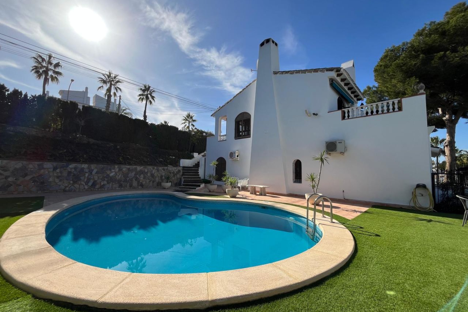 Detached villa in Villamartín with a pool, golf course views, and 4 bedrooms