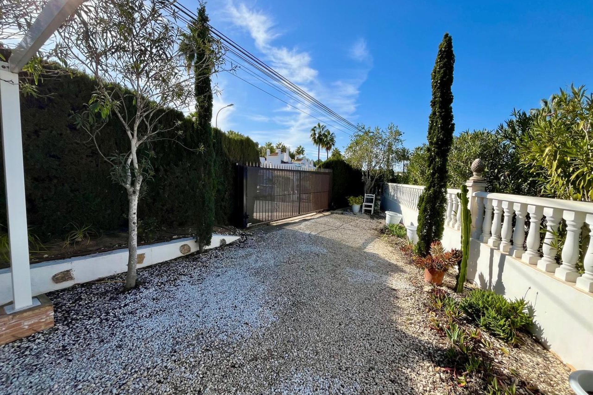 Detached villa in Villamartín with a pool, golf course views, and 4 bedrooms