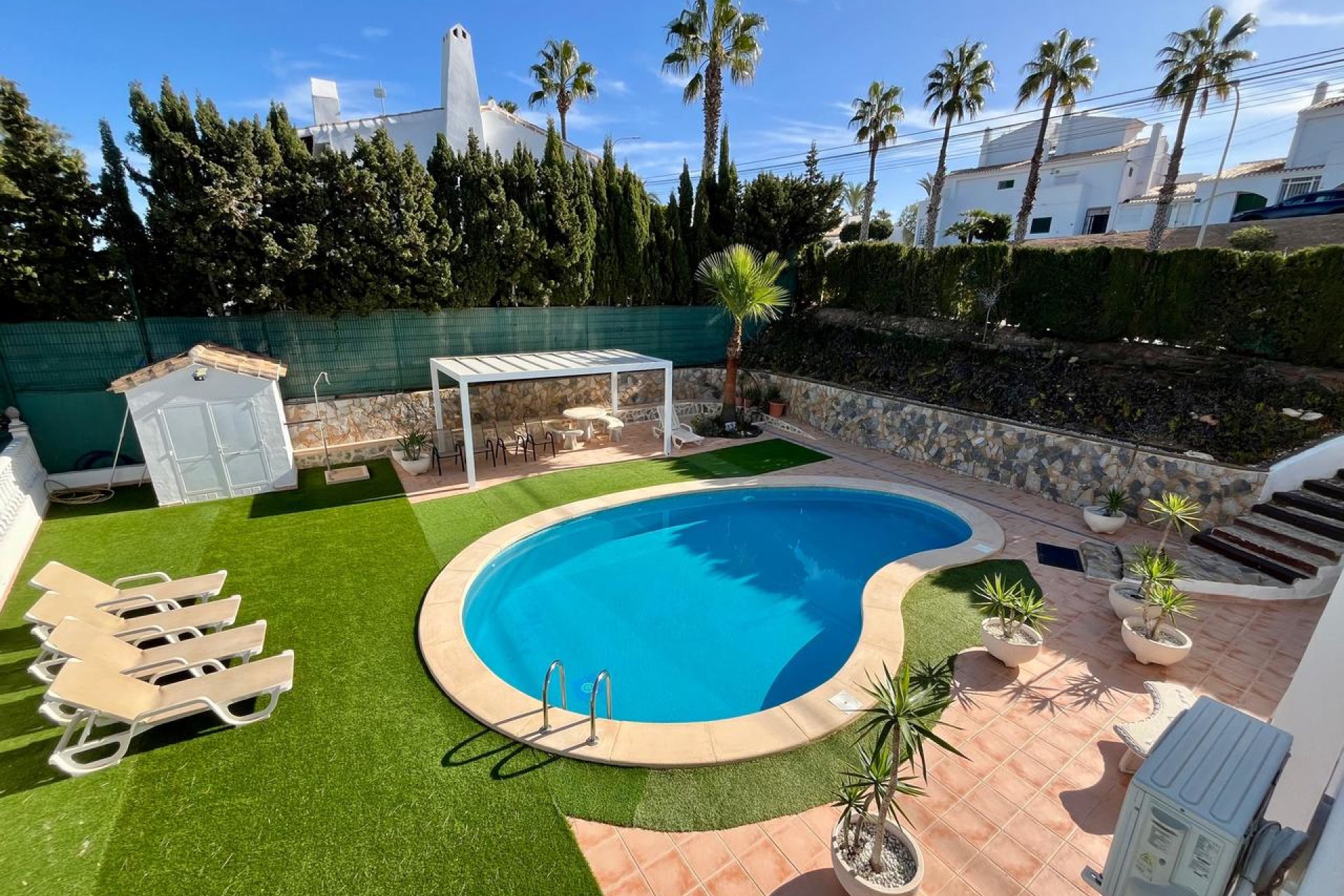 Detached villa in Villamartín with a pool, golf course views, and 4 bedrooms
