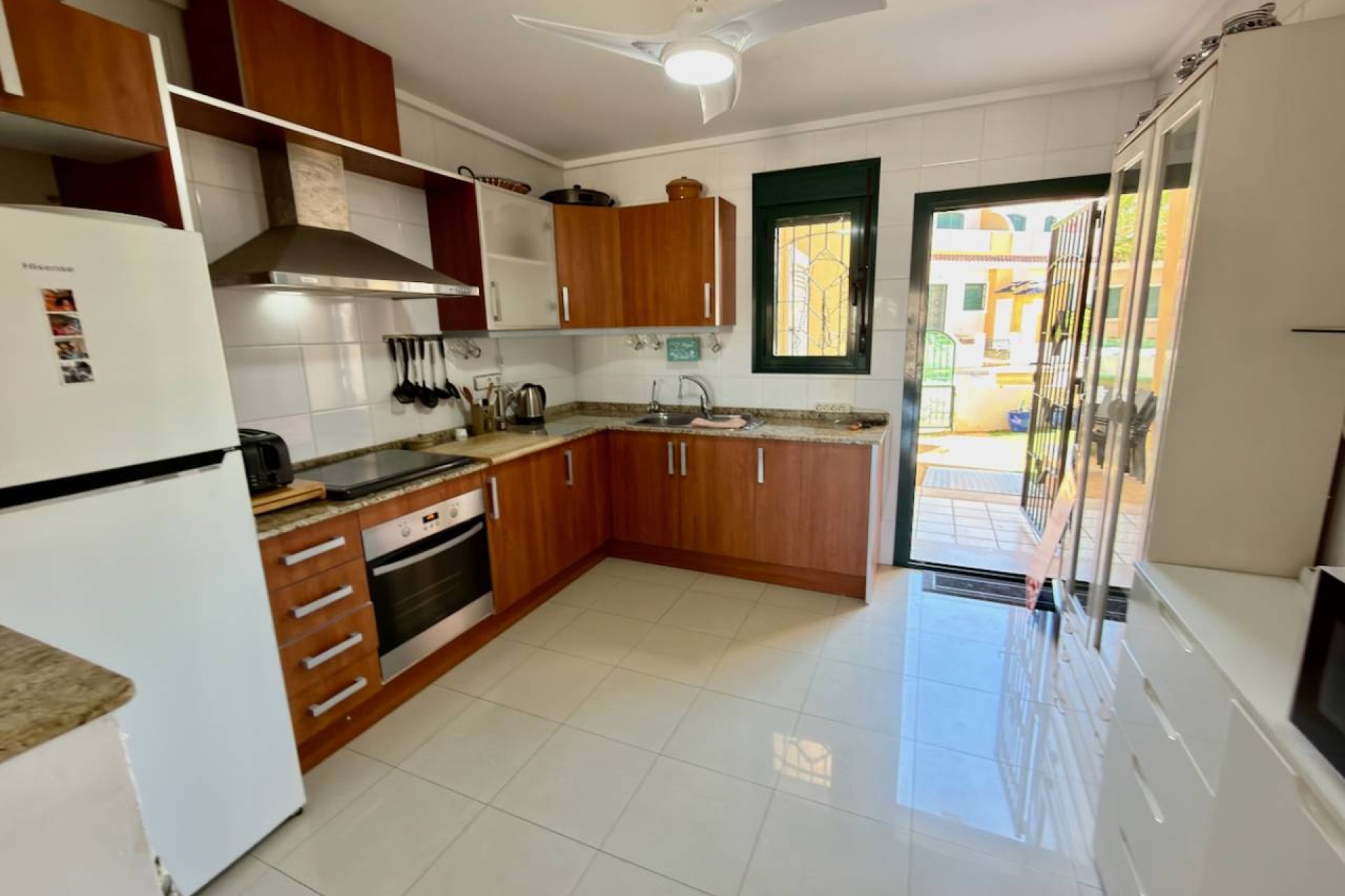 ﻿Elegant 2-bedroom apartment in Ciudad Quesada with a pool and garden