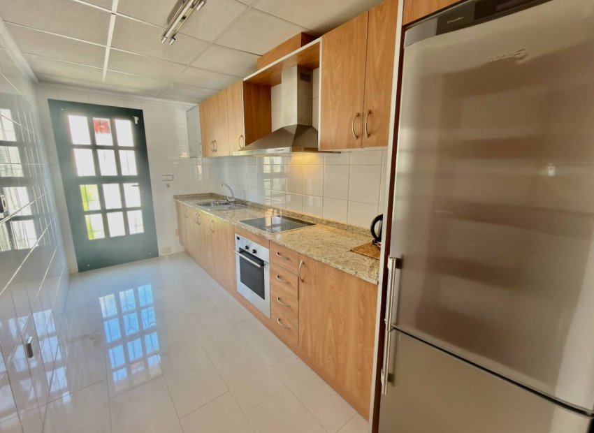 Elegant 3-bedroom townhouse with a garden and shared pool in Ciudad Quesada