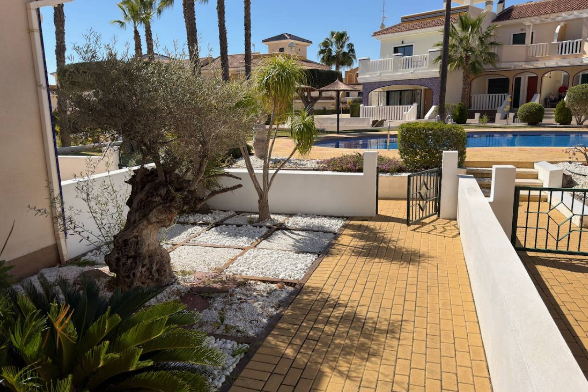 Elegant 3-bedroom townhouse with a garden and shared pool in Ciudad Quesada