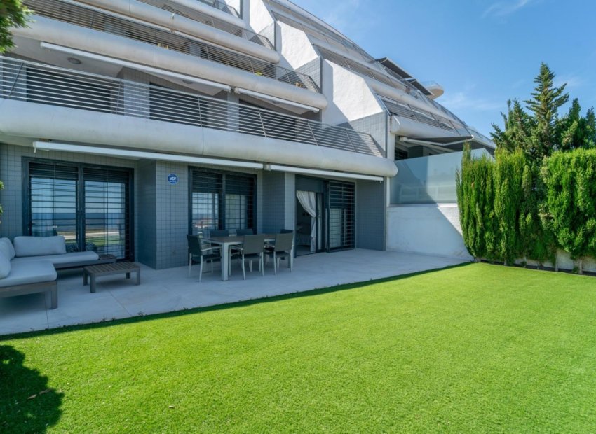 Exclusive apartment in Arenales del Sol with sea views, garden, and pool