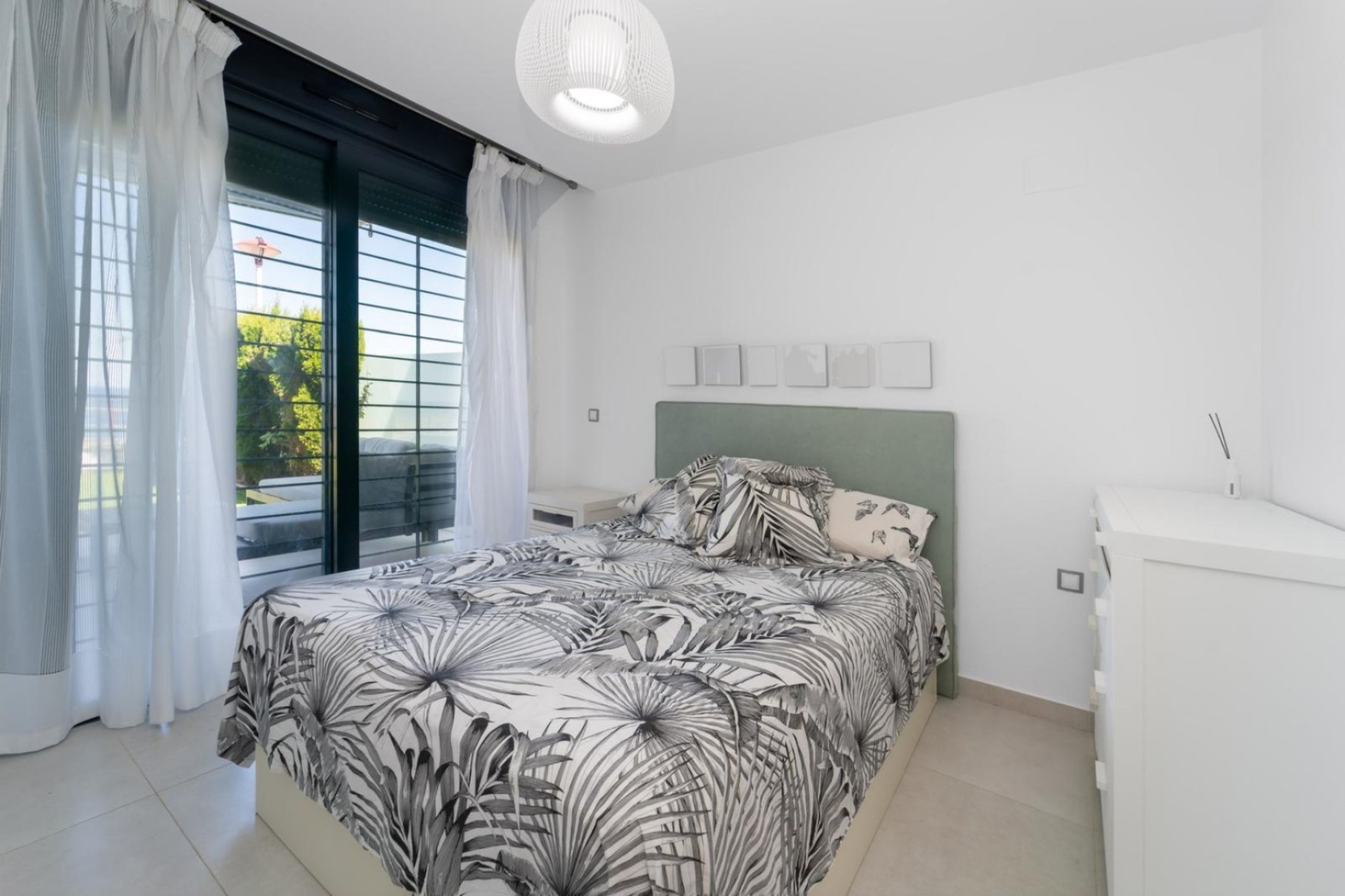 Exclusive apartment in Arenales del Sol with sea views, garden, and pool