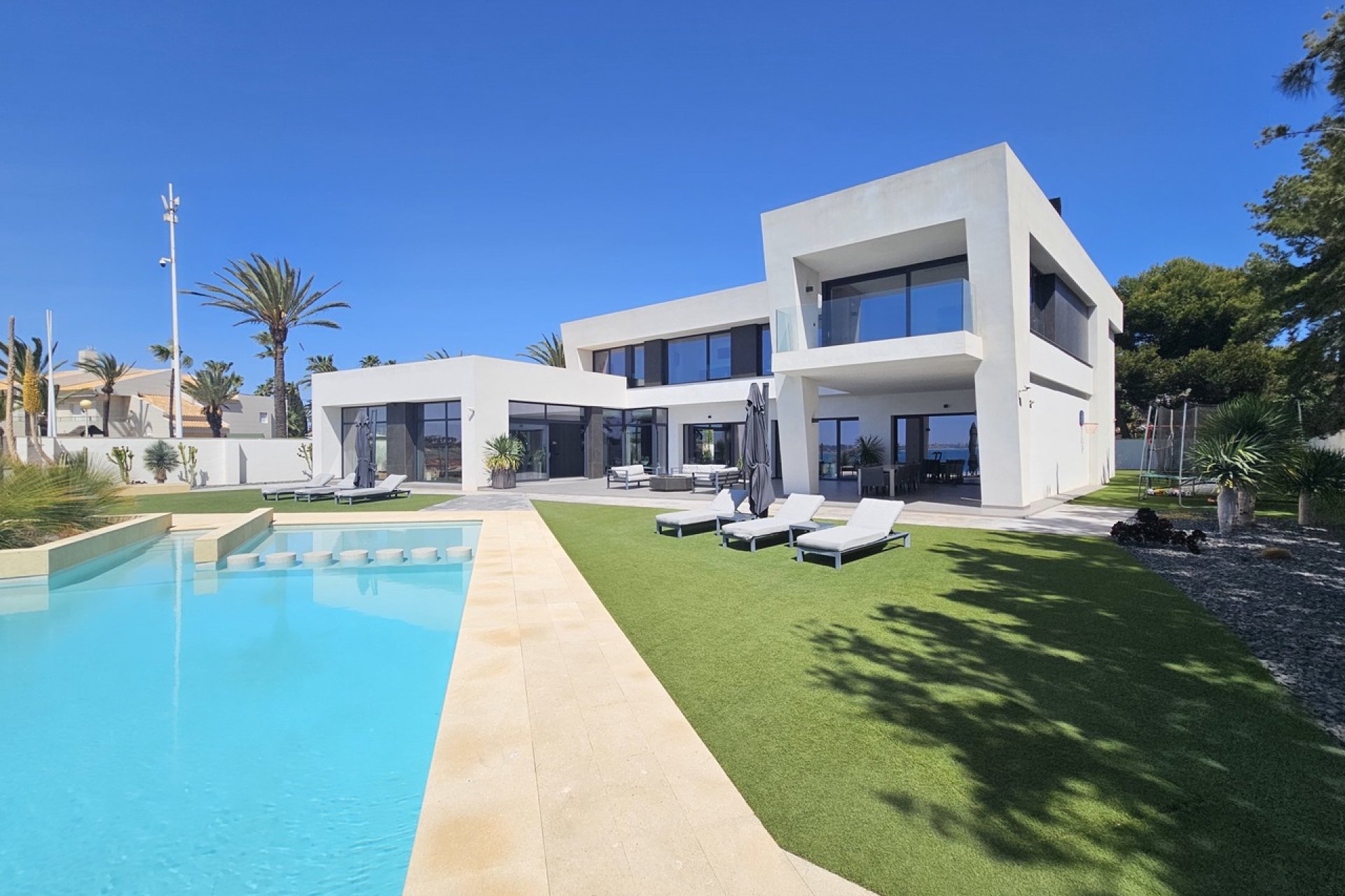 Exclusive seaside villa in Cabo Roig with panoramic views and a private pool