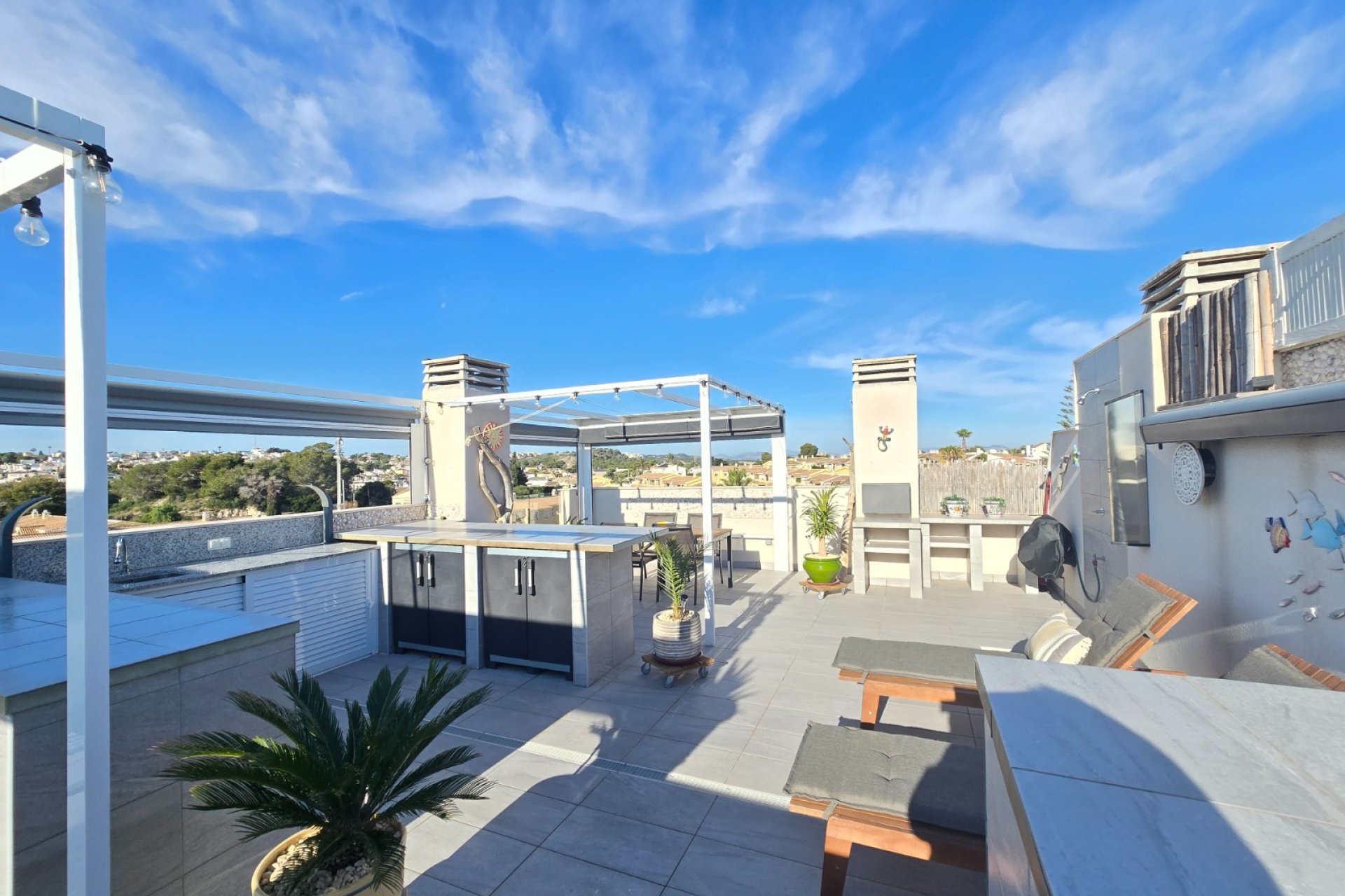 Luxury south-facing penthouse with ocean views, a sun deck, and a garage in Orihuela Costa