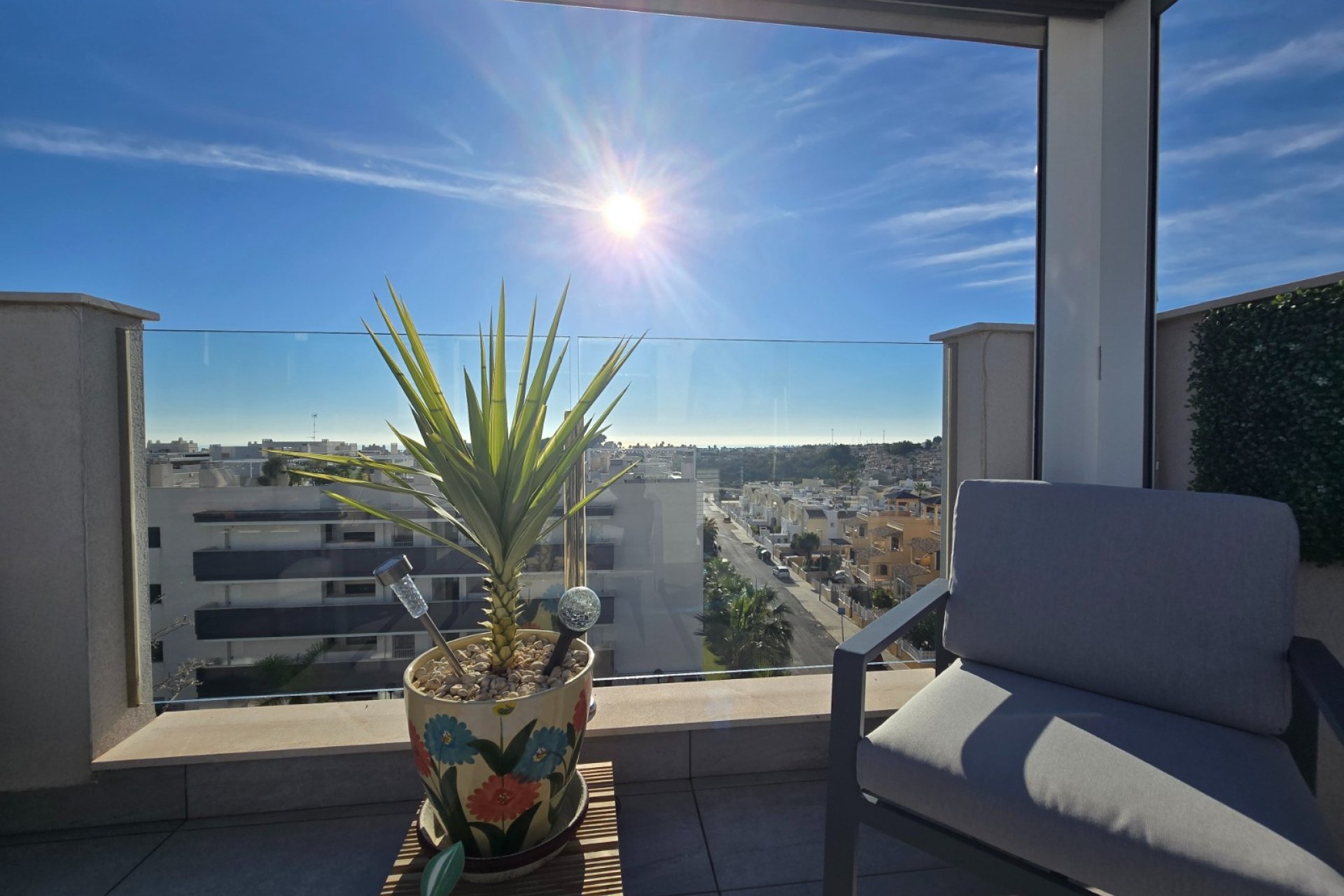 Luxury south-facing penthouse with ocean views, a sun deck, and a garage in Orihuela Costa