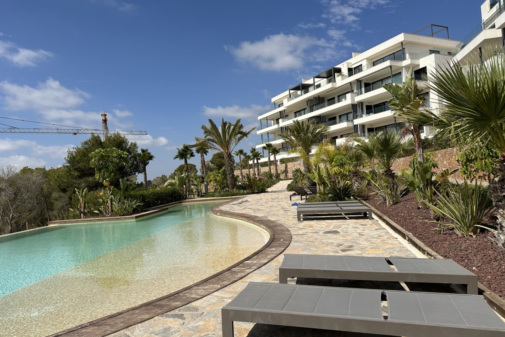 Modern apartment with ocean views and a pool in Campoamor