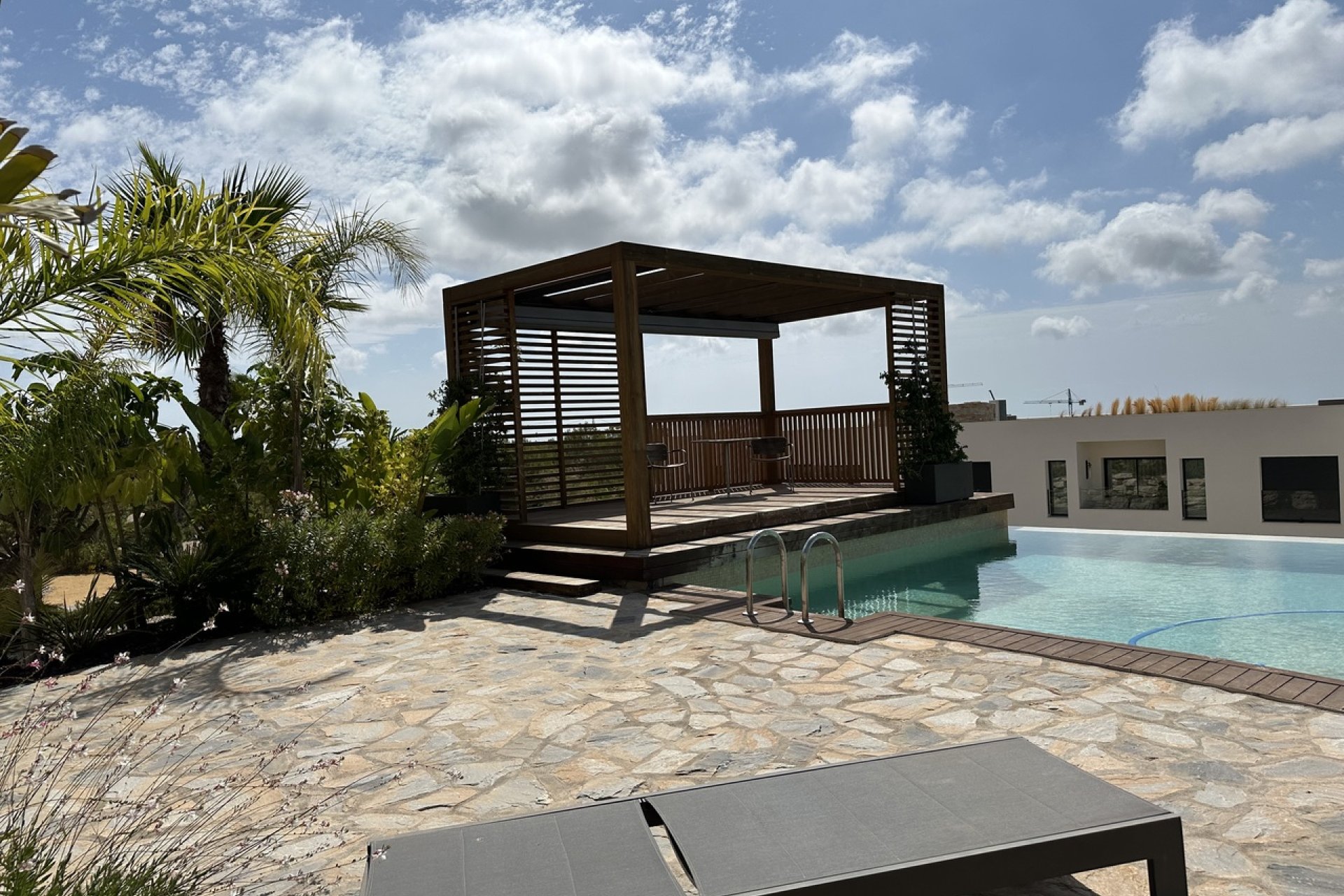 Modern apartment with ocean views and a pool in Campoamor