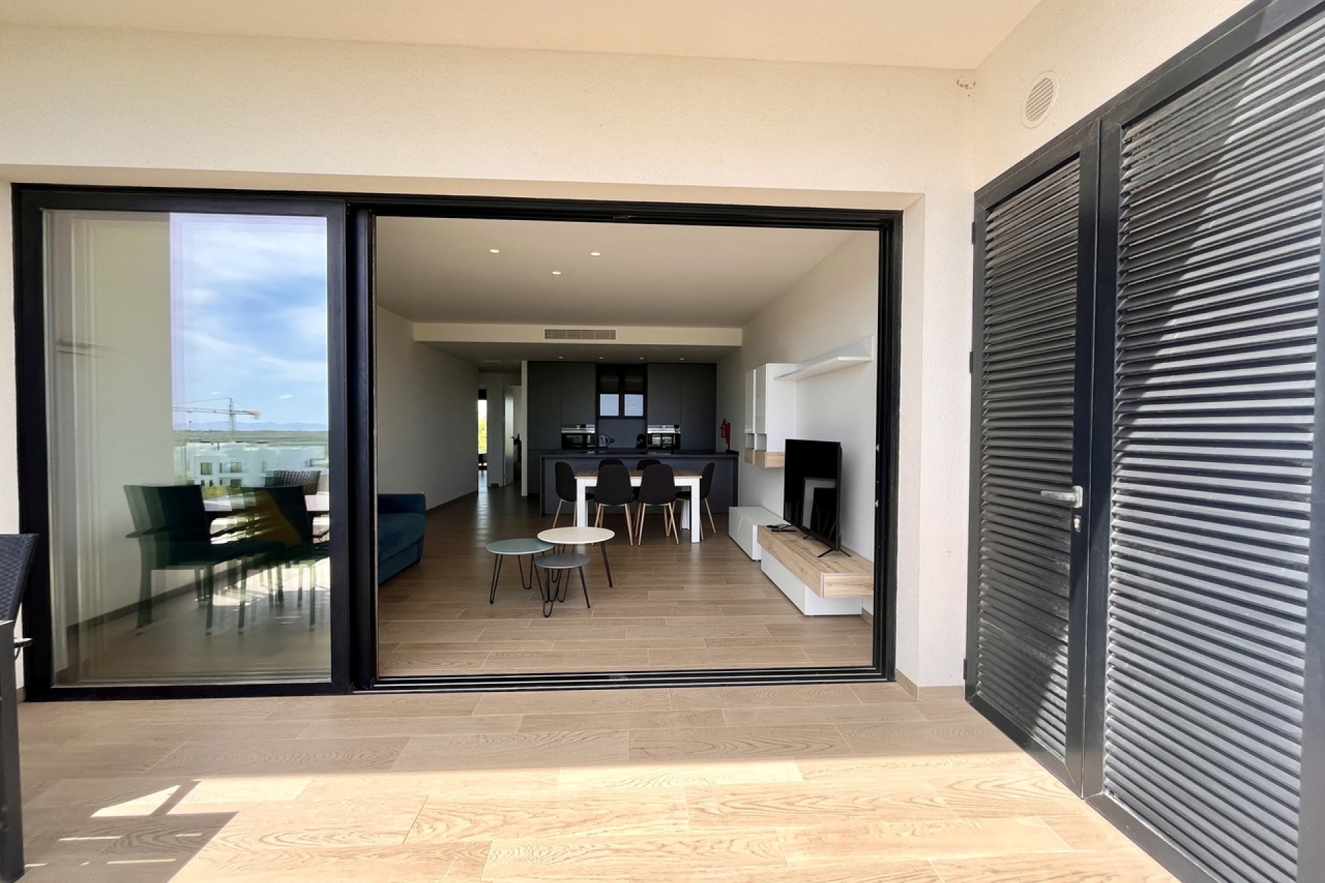 Modern apartment with ocean views and a pool in Campoamor