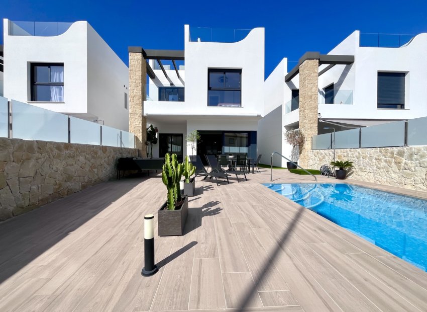 Modern villa in Punta Prima with a private pool and rooftop terrace