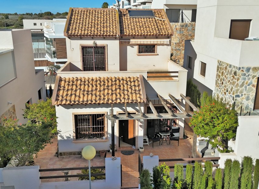 Modern villa with garden and communal pool in Villamartín close to golf courses