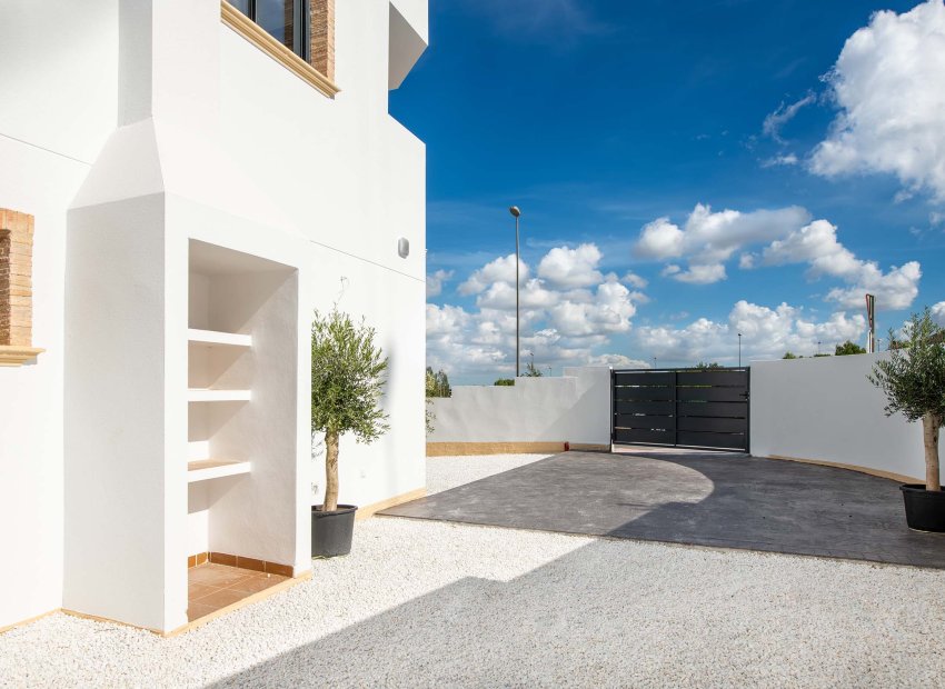 Obra nueva - Casa Adosada -
Cox