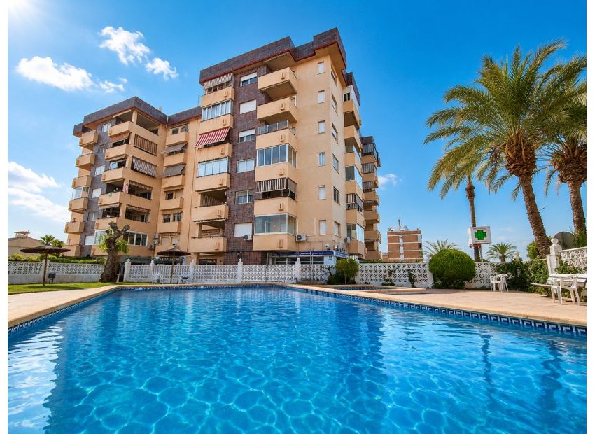 Penthouse in La Zenia with ocean views, pool, and garage