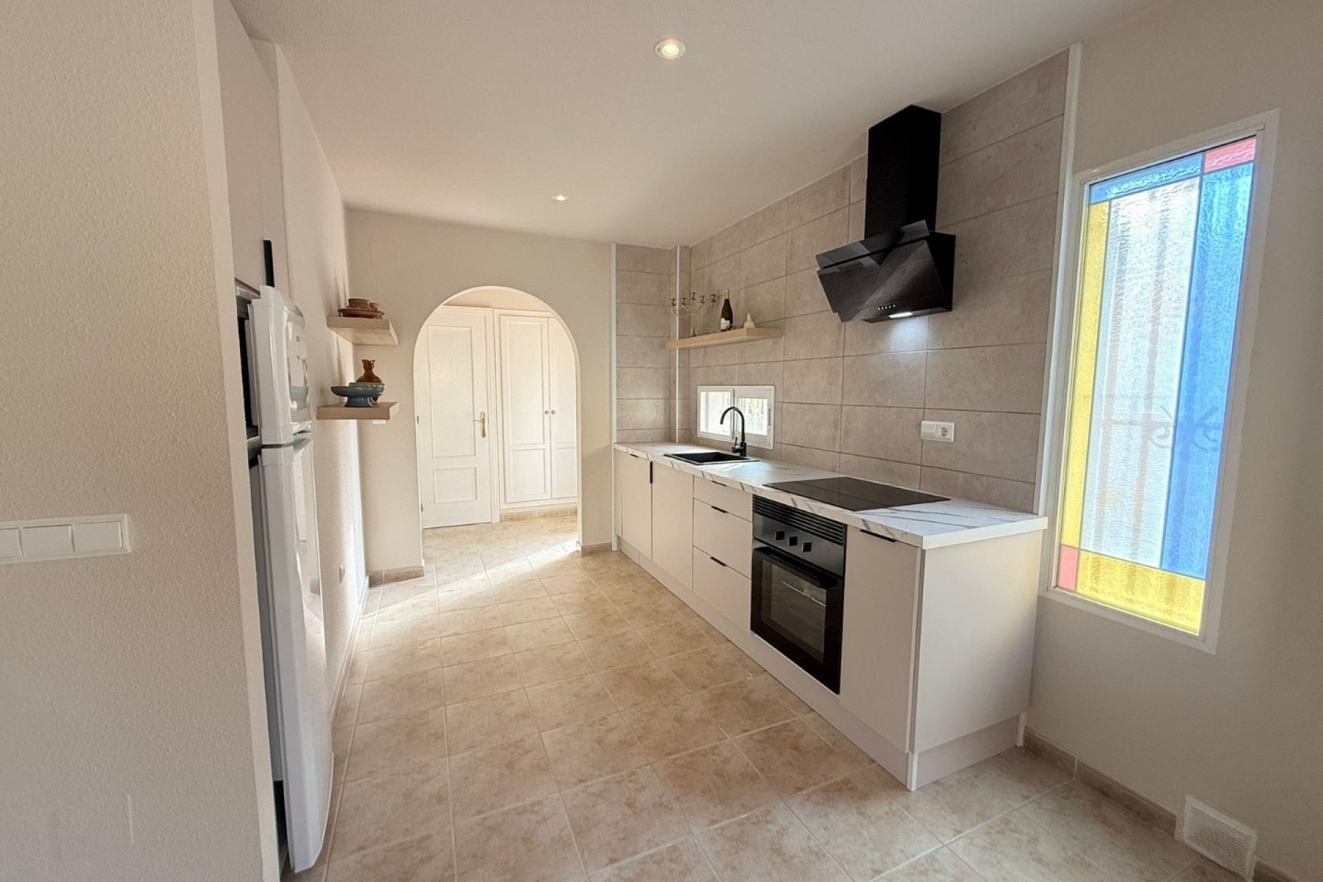 Spacious renovated 'maite' house with 4 bedrooms and communal pool in Benijofar