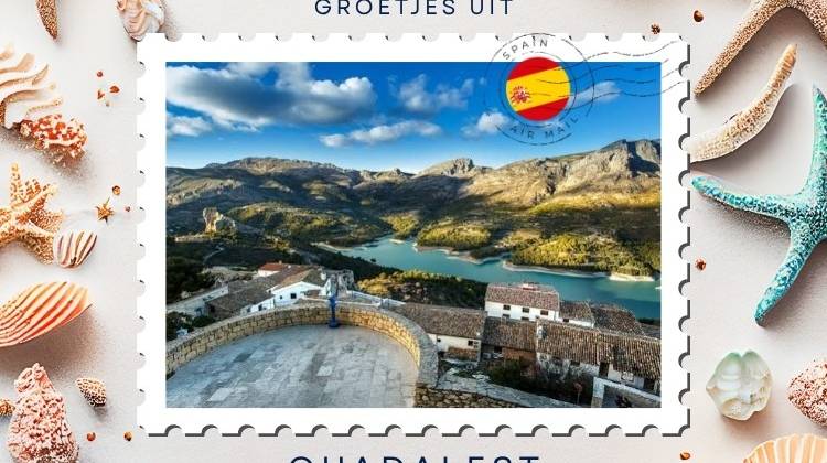 Greetings from Guadalest: castle, mountains and a turquoise reservoir